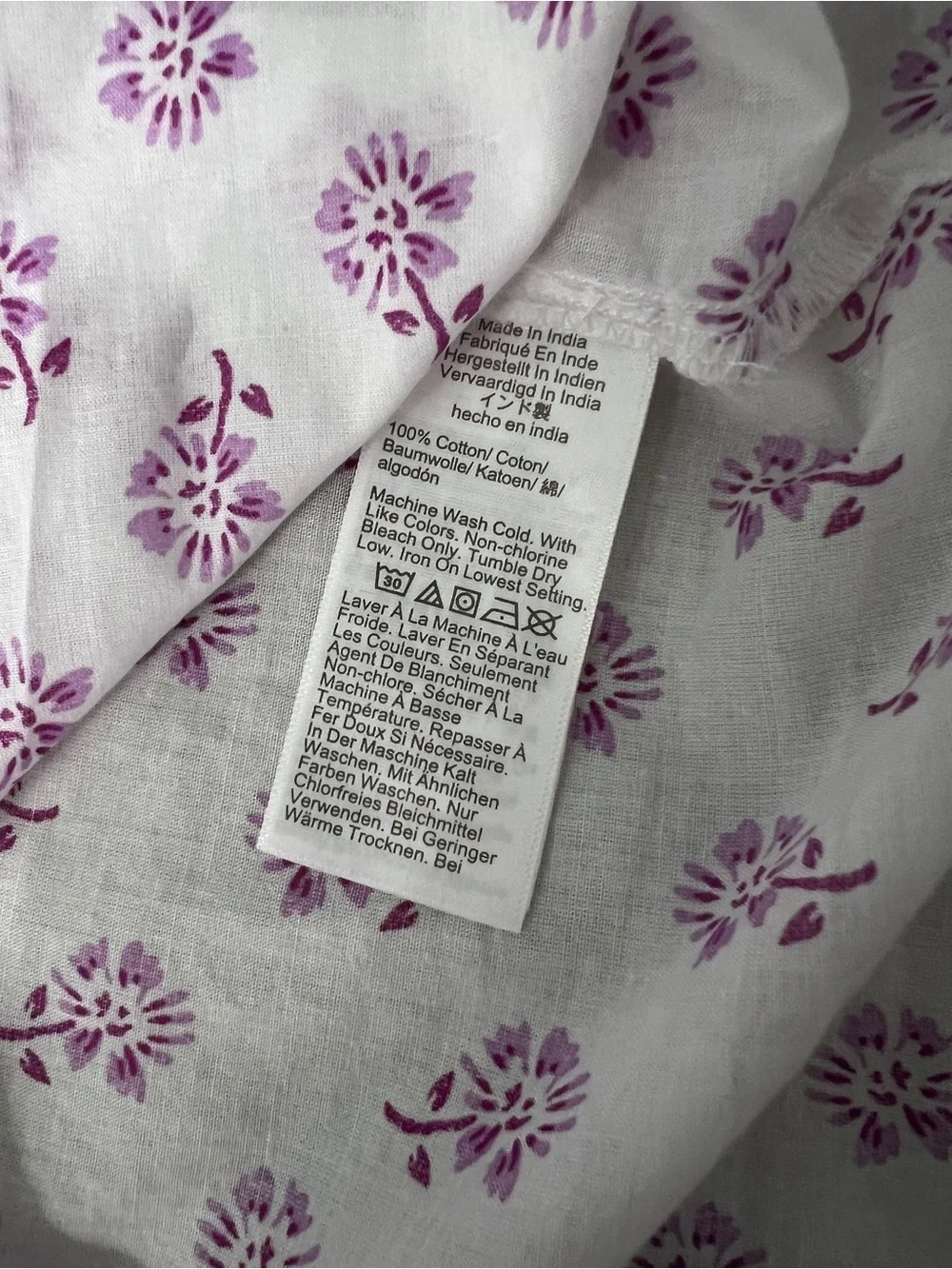J.Crew Factory flutter-sleeve top features a white base with a purple floral